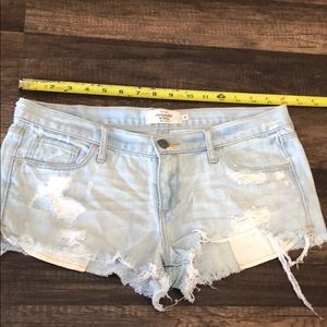 Distressed jean shorts.